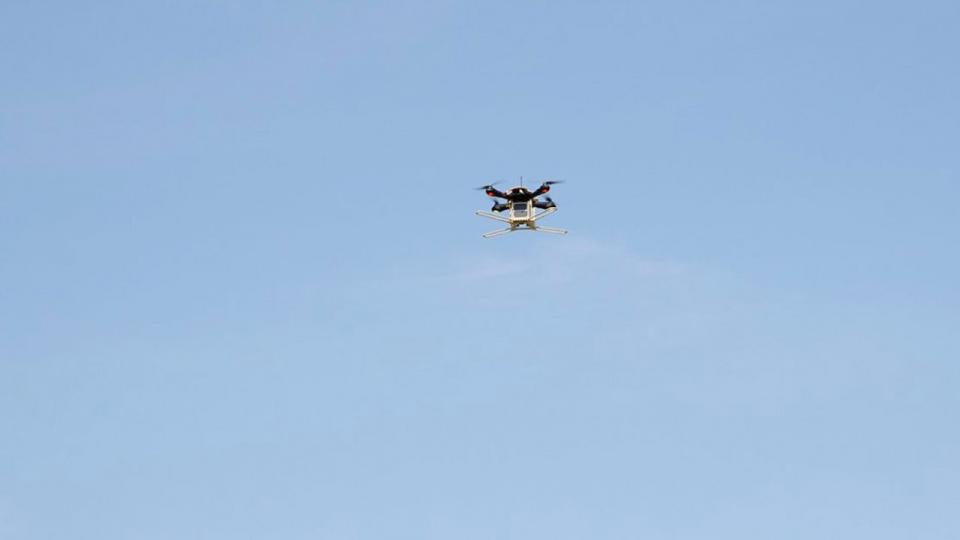 Kitsat flying under a drone